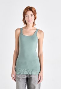 Длинный топ