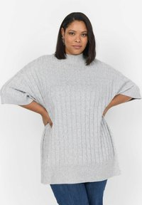 Длинный пуловер