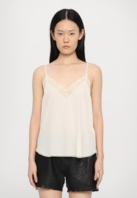 Топ на бретельках