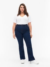 Клешеные брюки