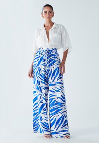 Брюки Брюки