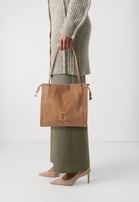 Кожаная сумка