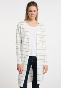 Длинный жилет