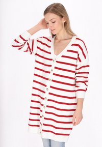 Длинный жилет