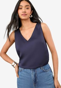 Длинный топ