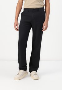 Льняные брюки