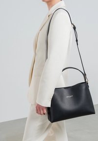 Кожаная сумка