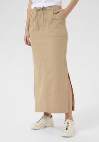 Юбка с накладными карманами