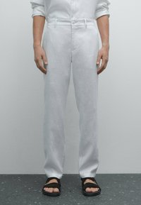 Льняные брюки