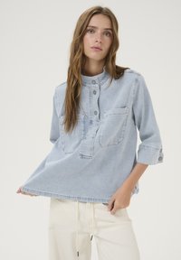 Джинсовая жилетка