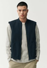 Жилет Жилет