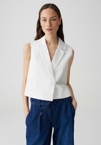 Джинсовая жилетка