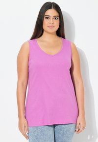 Длинный топ