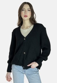 Длинный жилет