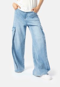 Широкие брюки Широкие брюки