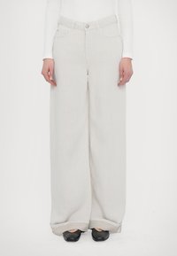 Джинсы бойфренда