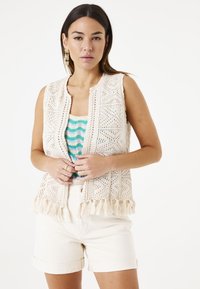 Джинсовая жилетка Джинсовая жилетка