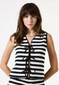 Жилет Жилет