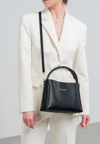 Кожаная сумка