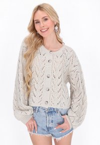 Вязаная кофта