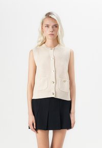 Джинсовая жилетка