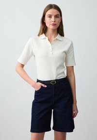 Джинсовые шорты