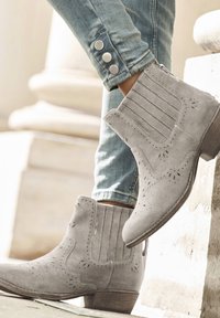 Ковбойские сапожки