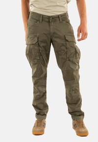 Брюки с накладными карманами Брюки с накладными карманами