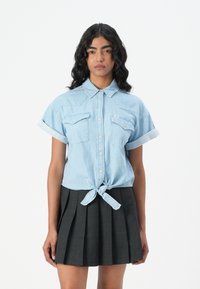 Джинсовая блузка