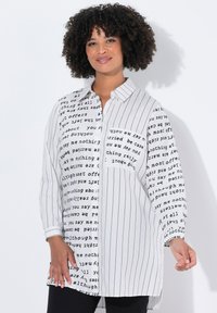 Длинная блузка Длинная блузка