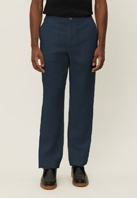 Льняные брюки