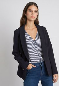 Блейзер Блейзер