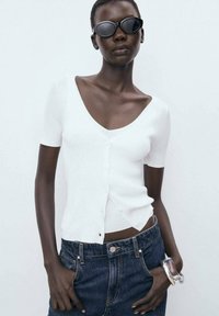 Вязаная кофта