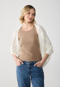 Вязаная кофта