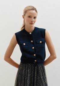 Жилет Жилет