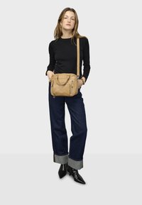 Кожаная сумка