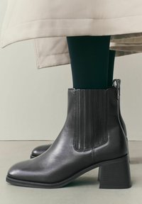 Широкие сапоги