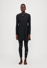 Слитный купальник