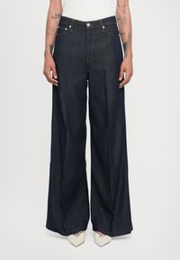 Джинсы бойфренда