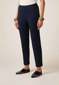 Узкие брюки