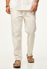 Льняные брюки