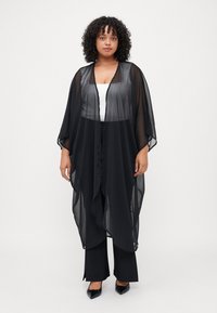 Длинная куртка