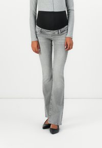 Клешеные джинсы Клешеные джинсы