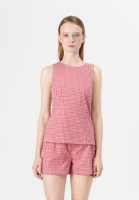 Блузка без рукавов