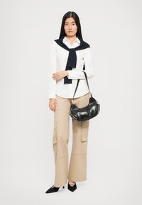 Кожаная сумка