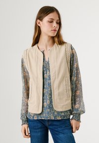 Джинсовая жилетка