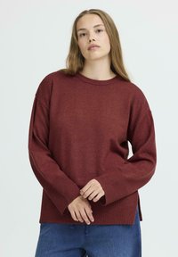 Длинный пуловер