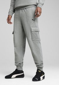 Брюки с накладными карманами Брюки с накладными карманами