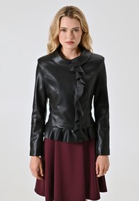 Кожаная куртка