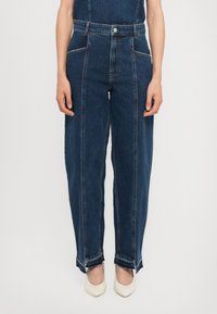 Джинсы бойфренда